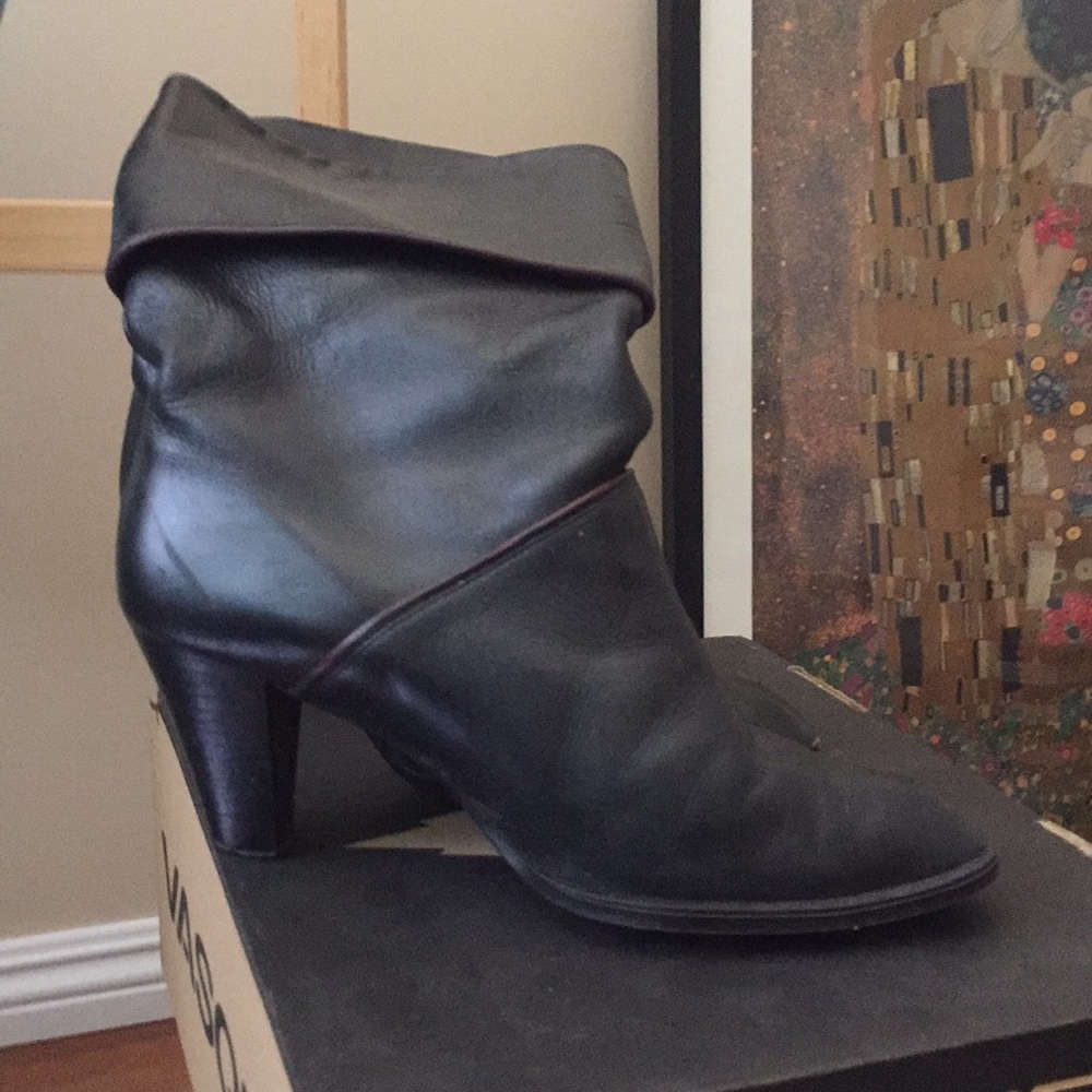 Black leather boots with red trim